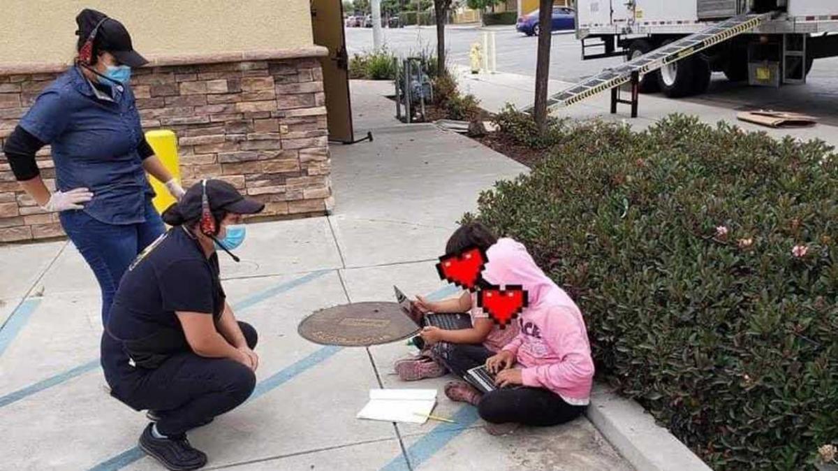 Kids outside doing homework
